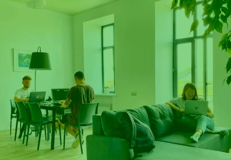 Chikara Houses Owners Duty co living rules  co living investment coliving property manager duty photo of people hanging out home some working the others reading very relax and lightful Chikara Houses room