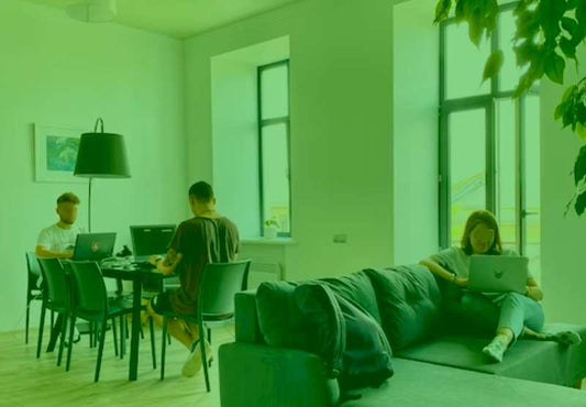 Chikara Houses Owners Duty co living rules  co living investment coliving property manager duty photo of people hanging out home some working the others reading very relax and lightful Chikara Houses room