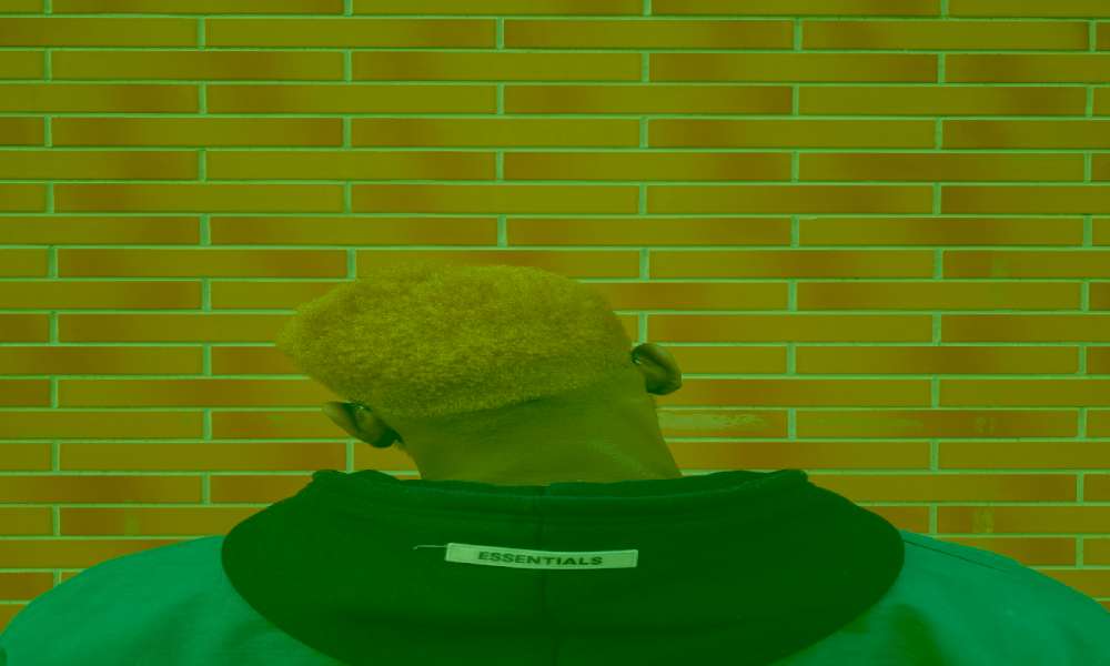 What is needed in order for someone academically unqualified to be as successful as someone academically qualified - chikara houses -  man in front of wall - academic shouldn't be a wall for your success