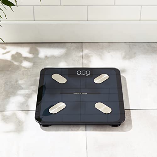 Smart Beauty Scale BMI Accurate to 0.05lb/0.02kg Bluetooth on the floor