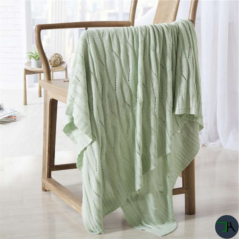 Eco-Friendly Bamboo Knitted Blanket for Cozy Nights | Sustainable Home Decor green chair