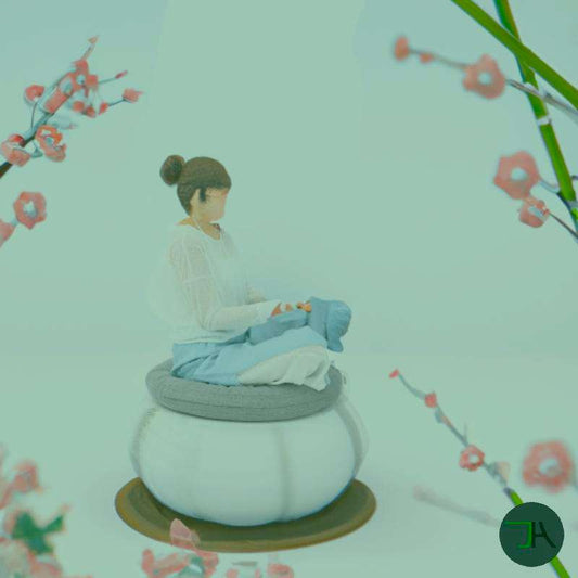 zencomfort Japanese Matt - Woman seated in a zen atmosphere with sakura flowers