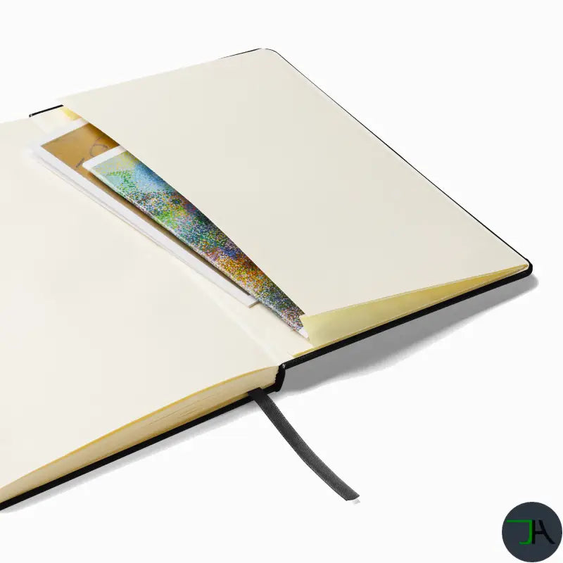 Open notebook with a colorful page on a white background