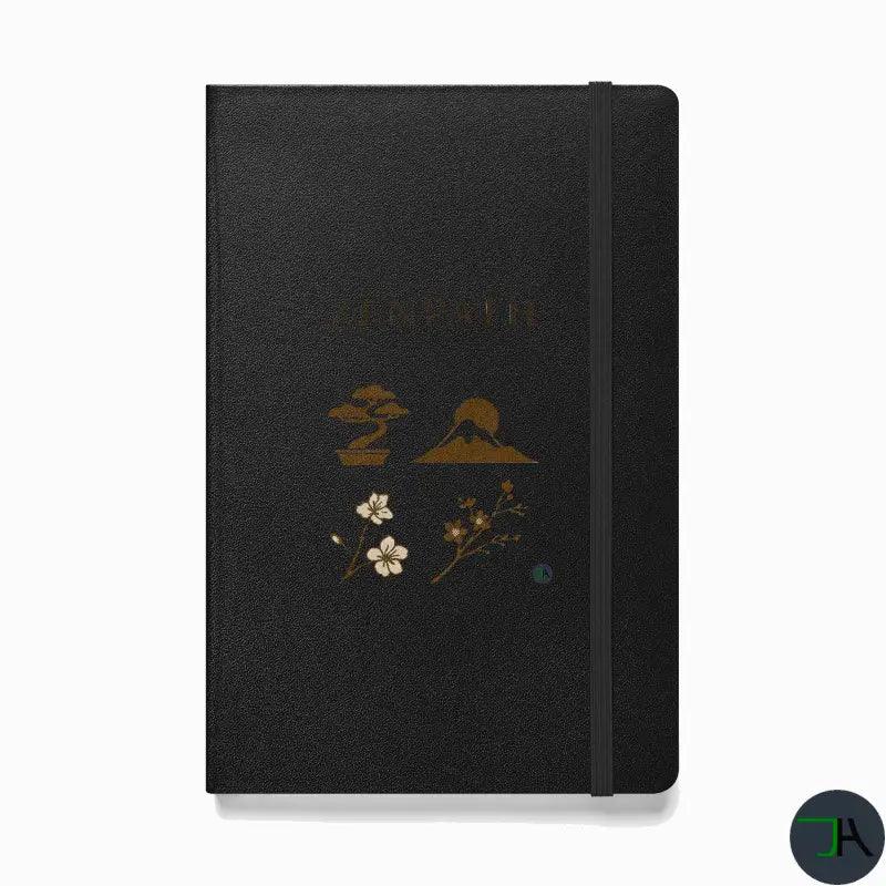 Black notebook with floral and mountain design on a white background