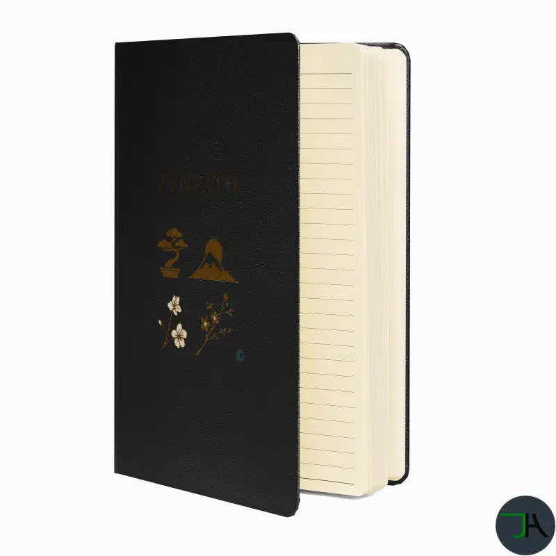 Black notebook with floral design on cover and cream pages