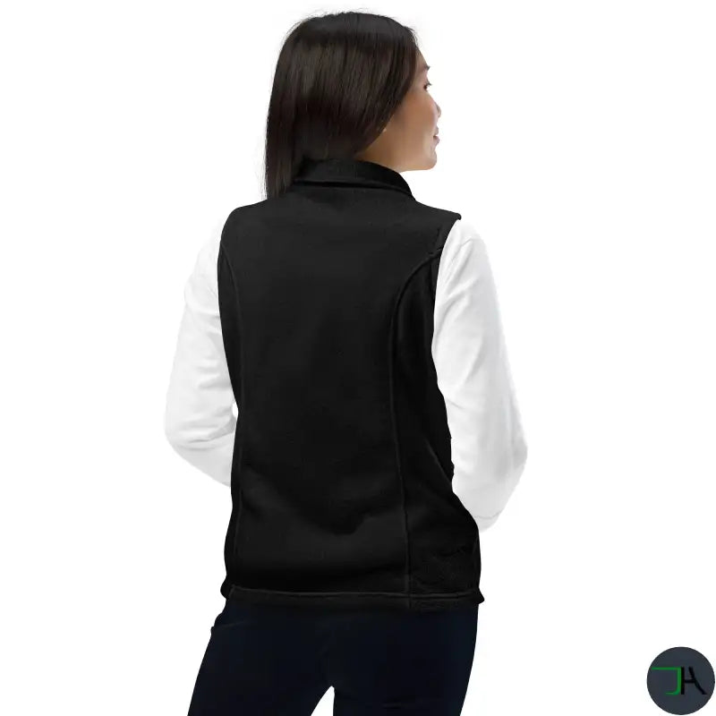 Stay Warm and Stylish on the Golf Course with Women’s Chikara Fleece Vest in Black - behind women